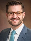 headshot of Greg Tasian